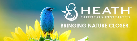 Heath Outdoor Products: Bringing Nature Closer with blue finch on sunflower